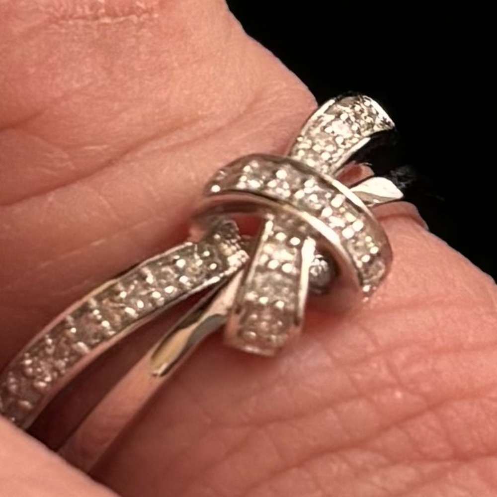 Dazzling Silver and Natural diamond ring. BOW style